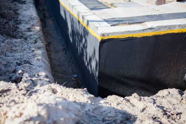 Professional Waterproofing technician working in Flora, IN